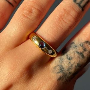 14k Gold donut band with blue sapphire and two old mine cut diamonds